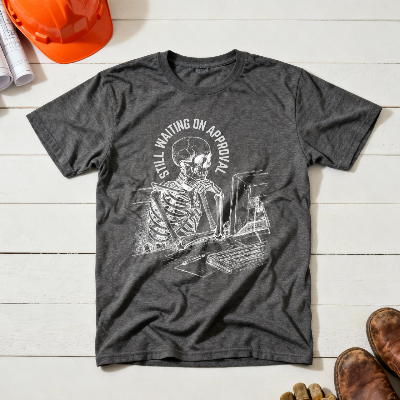 Still Waiting on Approval Skeleton Desk Construction Humor Unisex Jersey Short Sleeve Tee