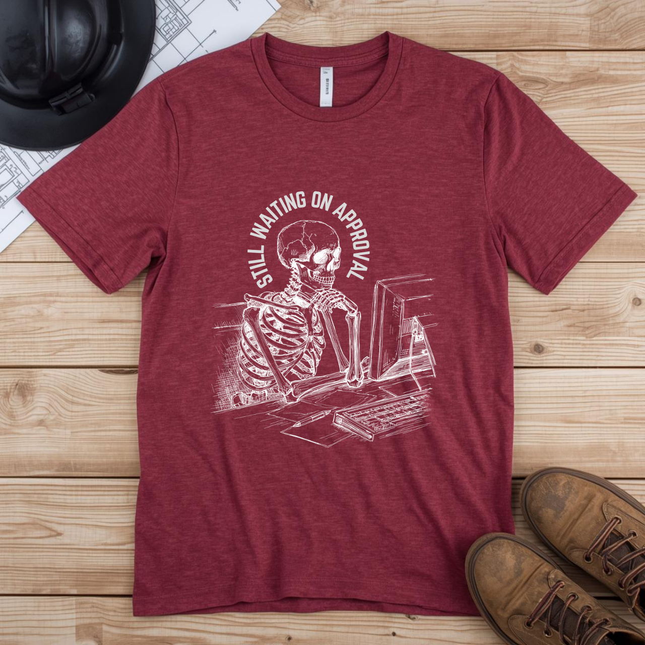 Still Waiting on Approval Skeleton Desk Construction Humor Unisex Jersey Short Sleeve Tee
