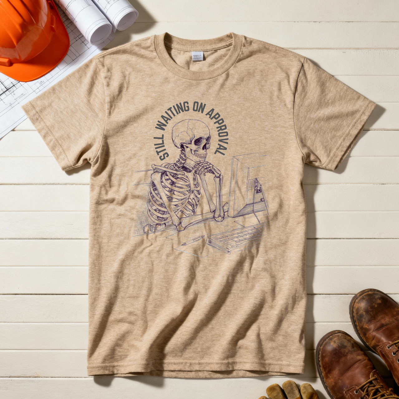 Still Waiting on Approval Skeleton Desk Construction Humor Unisex Jersey Short Sleeve Tee