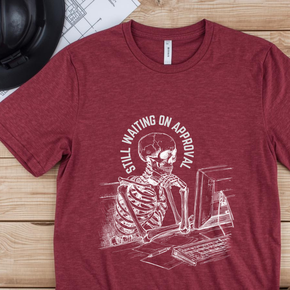 Still Waiting on Approval Skeleton Desk Construction Humor Unisex Jersey Short Sleeve Tee